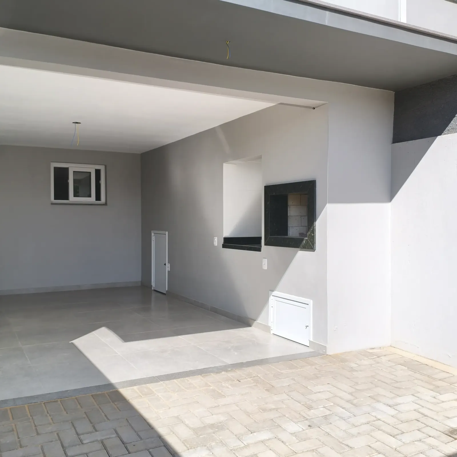 Garagem com churrasqueira 