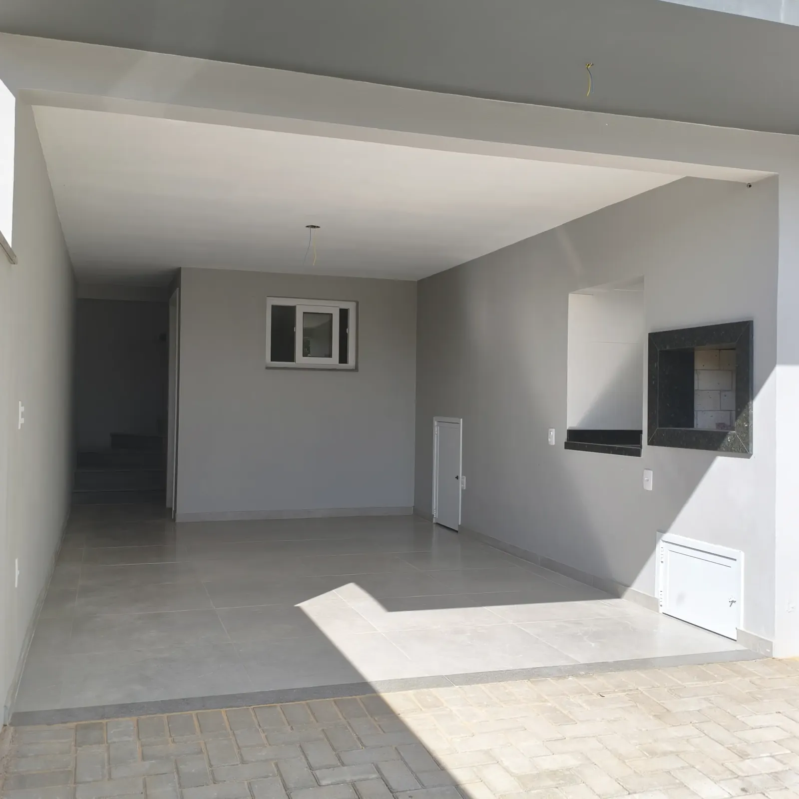 Garagem com churrasqueira 