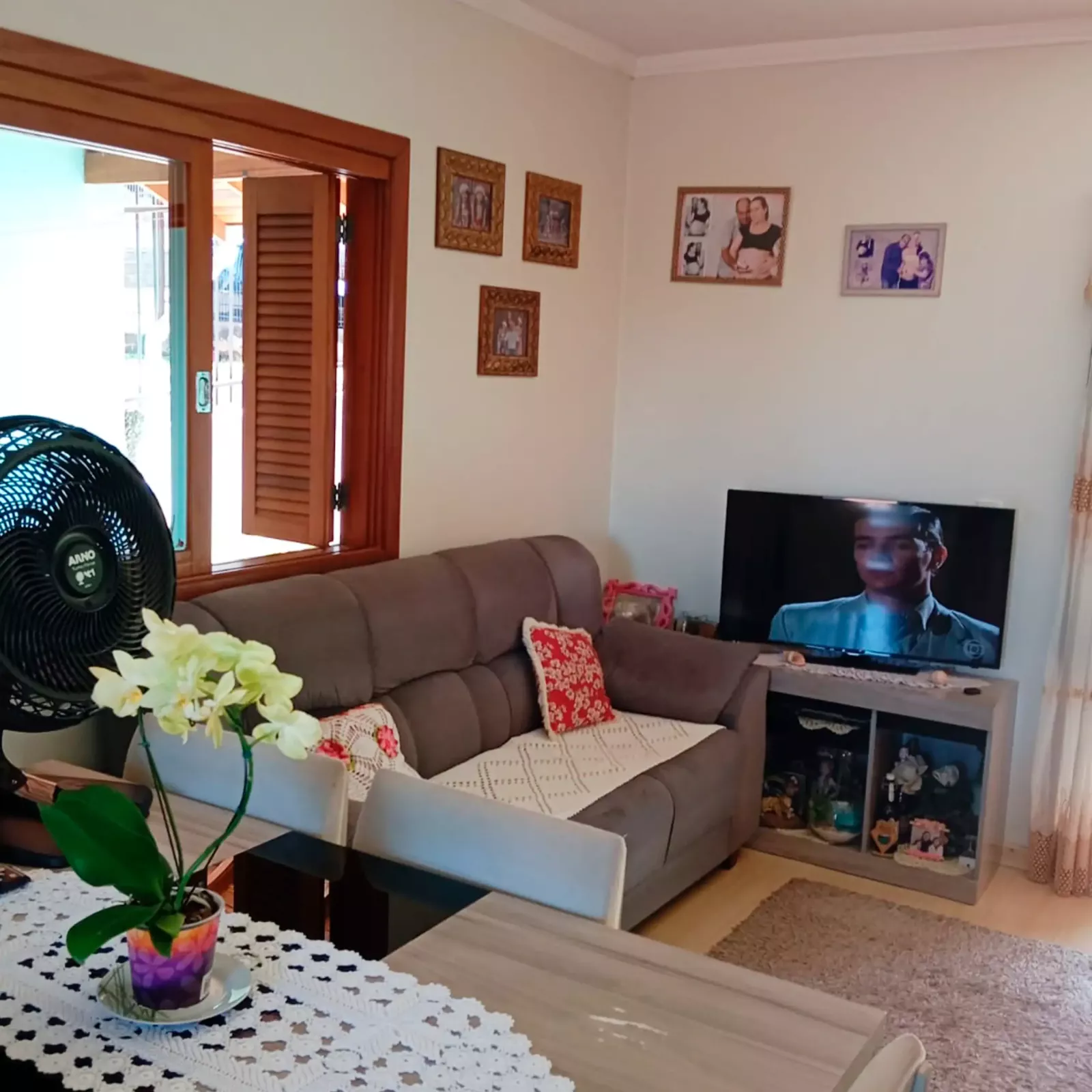 Sala de estar integrada a cozinha