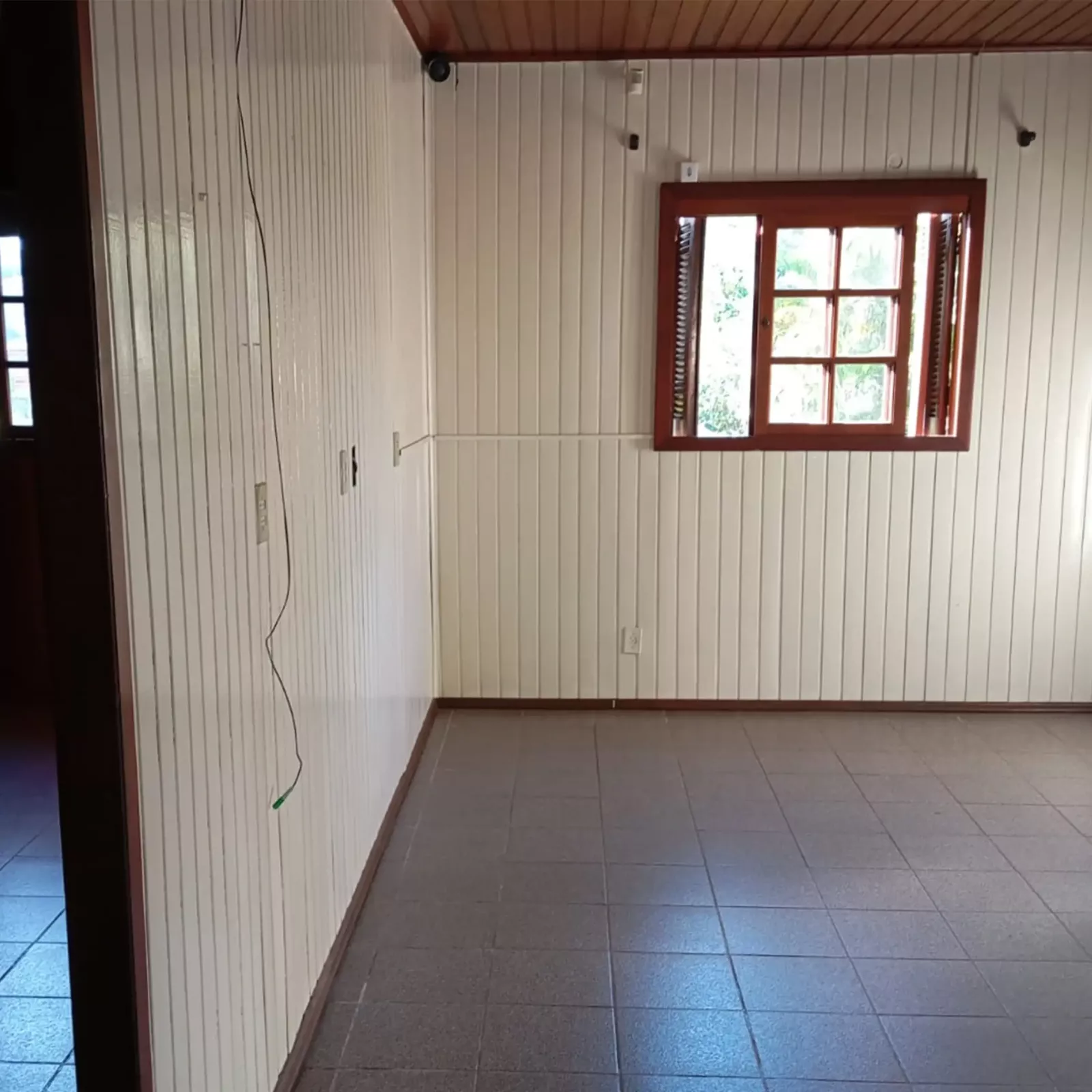 Sala de estar com acesso aos quartos