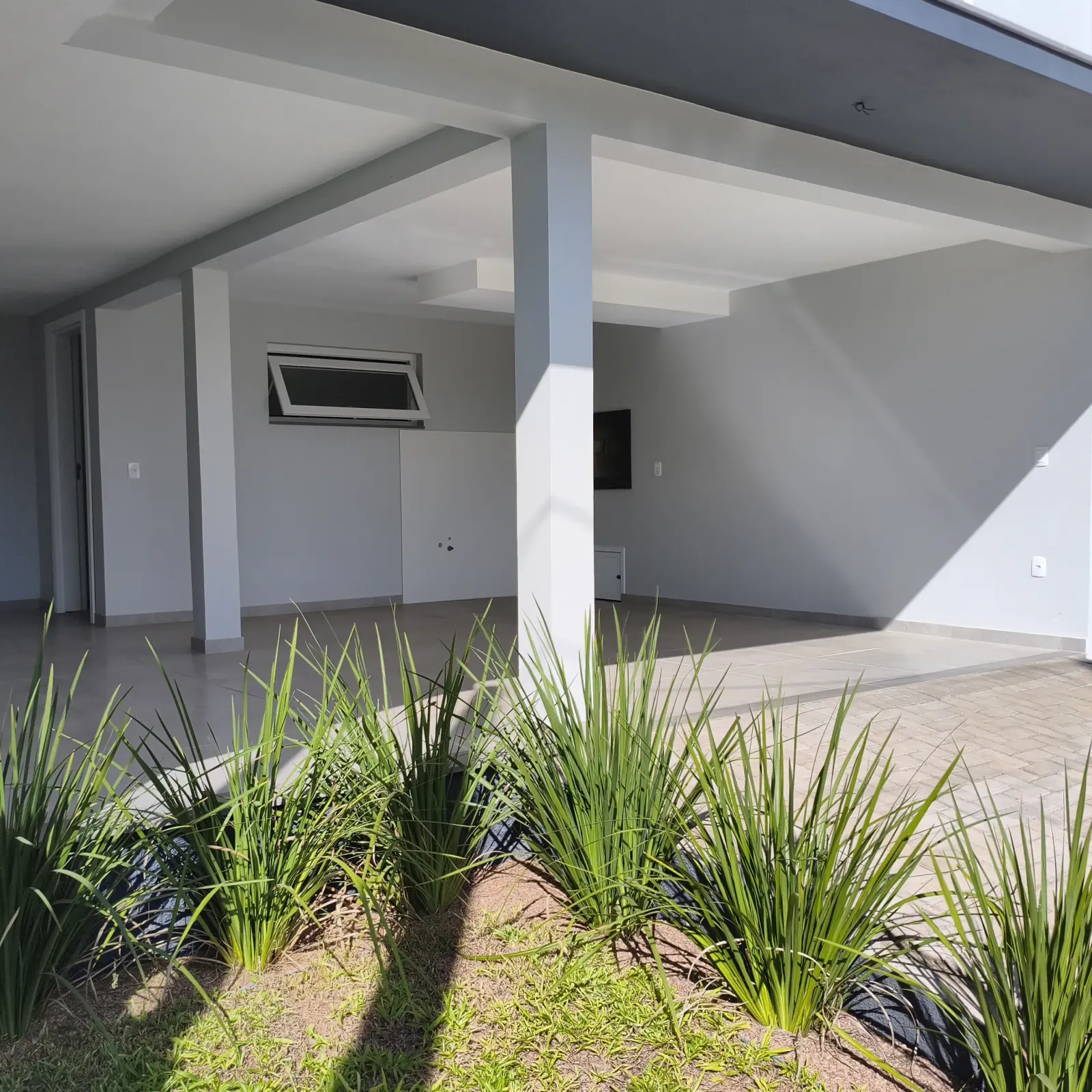 Garagem com churrasqueira 